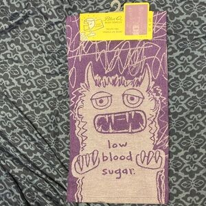 Blue Q Quirky Purple Monster “low blood sugar” Towel